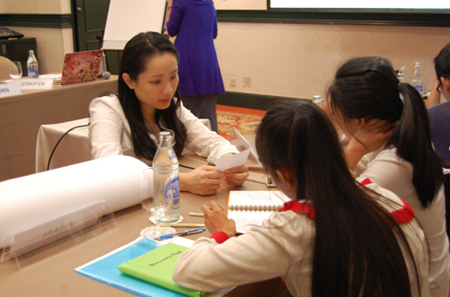 TREAT Asia consultant Jennifer Ho (far right) with two Youth ACATA participants during the Bangkok workshop