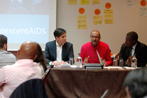 Chris Collins (left) and UNAIDS Executive Director Michel Sidibé (center)during a platform meeting for the All In initiative to end adolescent HIV 
